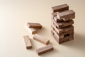 Hardwood Blocks Stacked in Tower on Smooth Neutral Background