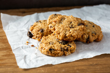 Freshly Baked Oatmeal Cookies with Chocolate Chips on Paper