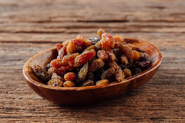 Handcrafted Wooden Bowl Filled with Assorted Dried Fruits and Nuts