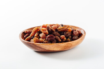 Assorted Dried Fruits in Wooden Bowl on White Background