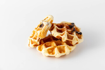 Freshly Made Waffles Stacked Together on a Minimal White Background
