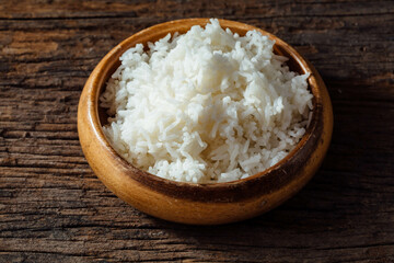 Freshly Cooked White Rice in a Natural Wooden Bowl on a Rustic Table