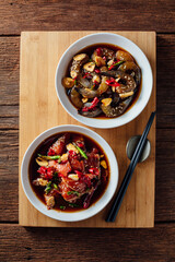 Vibrant Chinese Dishes with Fresh Ingredients on Wooden Board