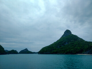 Beautiful Seascape with Mountains, Blue Ocean, and Islands under Clear Sky at Ang Thong National Marine Park, Koh Samui, Thailand