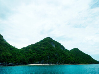 Beautiful Seascape with Mountains, Blue Ocean, and Islands under Clear Sky at Ang Thong National Marine Park, Koh Samui, Thailand