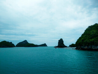 Beautiful Seascape with Mountains, Blue Ocean, and Islands under Clear Sky at Ang Thong National Marine Park, Koh Samui, Thailand