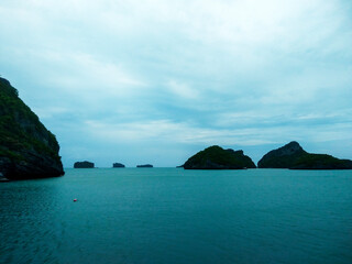 Beautiful Seascape with Mountains, Blue Ocean, and Islands under Clear Sky at Ang Thong National Marine Park, Koh Samui, Thailand