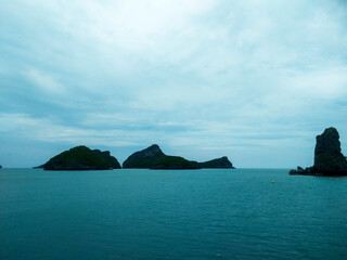 Beautiful Seascape with Mountains, Blue Ocean, and Islands under Clear Sky at Ang Thong National Marine Park, Koh Samui, Thailand