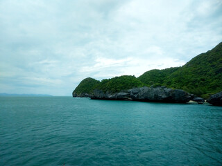 Beautiful Seascape with Mountains, Blue Ocean, and Islands under Clear Sky at Ang Thong National Marine Park, Koh Samui, Thailand