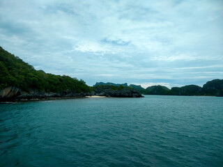 Beautiful Seascape with Mountains, Blue Ocean, and Islands under Clear Sky at Ang Thong National Marine Park, Koh Samui, Thailand