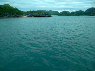 Beautiful Seascape with Mountains, Blue Ocean, and Islands under Clear Sky at Ang Thong National Marine Park, Koh Samui, Thailand