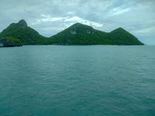 Beautiful Seascape with Mountains, Blue Ocean, and Islands under Clear Sky at Ang Thong National Marine Park, Koh Samui, Thailand