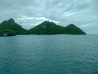 Beautiful Seascape with Mountains, Blue Ocean, and Islands under Clear Sky at Ang Thong National Marine Park, Koh Samui, Thailand