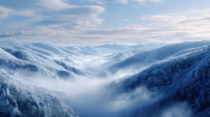 Aerial View of Snow Covered Mountain Range with Fog
