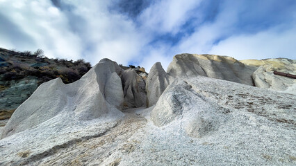 Dramatic  rock formations on the lake edge   of the  Blue Lake - St Bathans