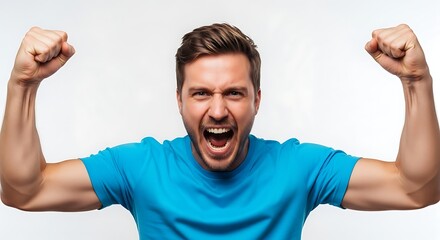 Fototapeta premium A man in a blue shirt with clenched fists raised and an expression of excitement