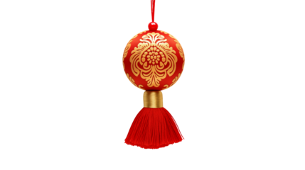 A red and gold chinese knot with tassel hanging against a black background in a centered composition
