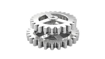 A close up of two interlocking metal gears with a black background in a studio shot for mechanics