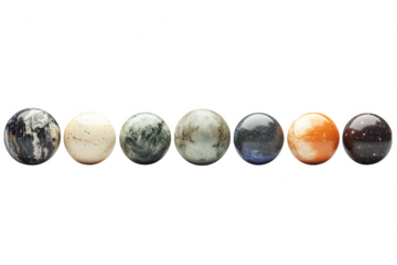 Collection of seven textured spheres resembling planets or marbles isolated on transparent background