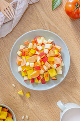 A close-up of Fresh fruit and vegetable salad.