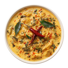 Delicious creamy chicken curry garnished with red chilies and fresh herbs in a white bowl