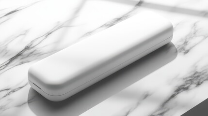 White rectangular case on a marble surface.