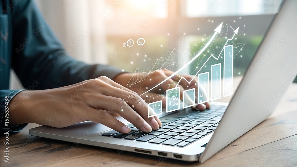 Poster hands typing on laptop with business growth chart overlay for data analysis.