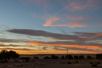 Beautiful full color image of a roadside sunset along the interstate at dusk