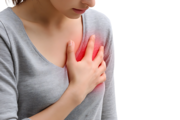 Woman experiencing chest pain, heart attack symptom.