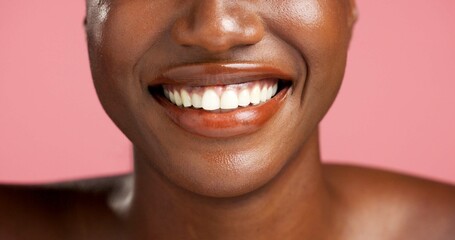 Beauty, cosmetics and teeth of black woman in studio for dermatology, skin hydration or vitamin C....