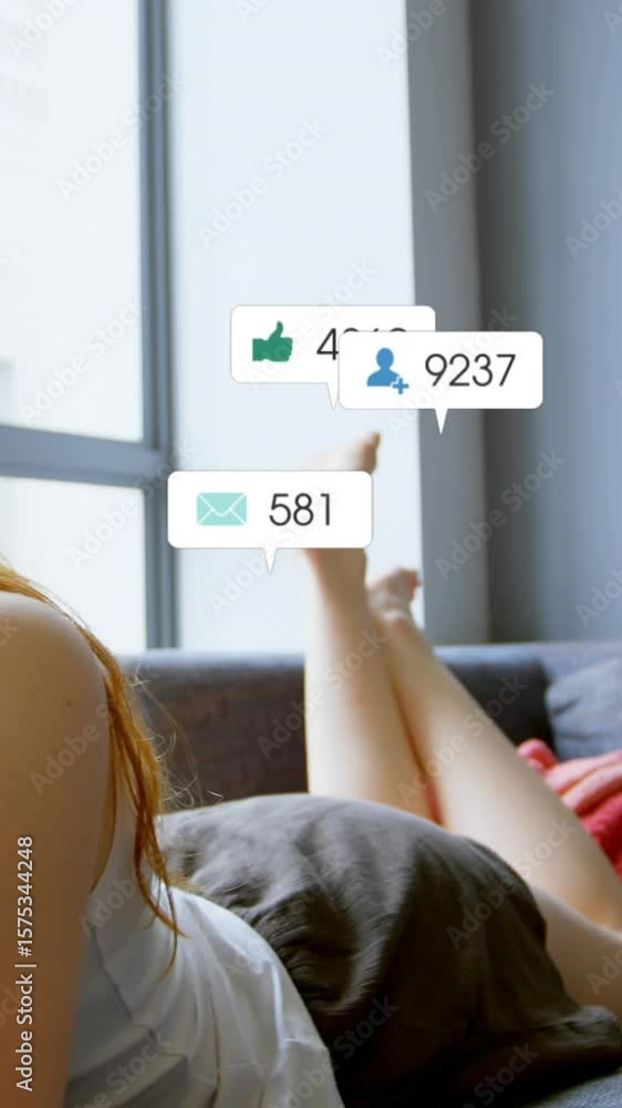 Poster animation of multiple notification bars over caucasian girl lying on bed and using digital tablet