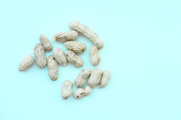 A scattering of fresh shelled peanuts, ready to eat, isolated.