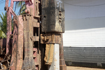 3 Ton of Drop Hammer of Pile Driver is driving prestressed concrete square pile head at...