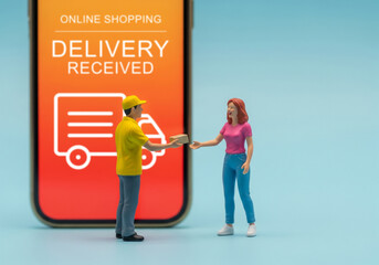 The customer is holding a parcel box that he just received. Miniature People