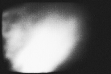 light leak overlay effect with scratch dust and light leaks,retro noisy film texture light leak flare on black background,black and white