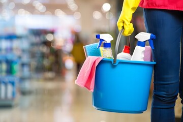 Cleaning Supplies in a Blue Bucket Ready for Housework