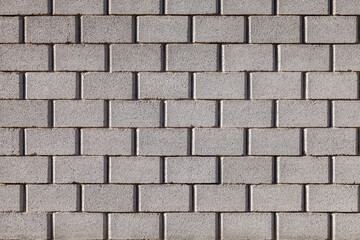 Seamless background texture of gray wall. Square photo pattern