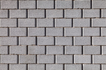 Gray brick wall with a gray brick pattern