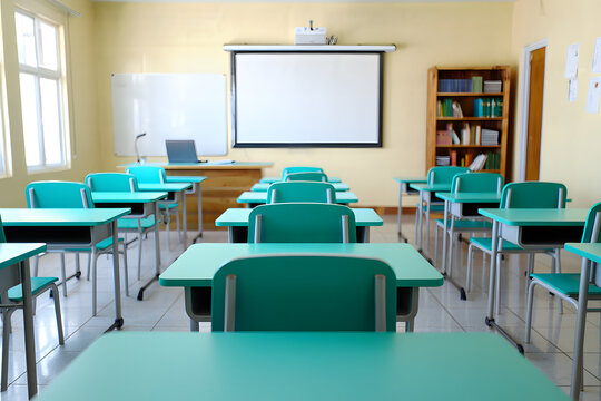 Empty teal classroom desks and chairs, whiteboard, projector screen, bright and airy atmosphere, educational setting.