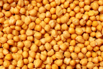 selective image of boiled chickpeas seed or garbanzo beans background texture, in south asia also known as chole or chana