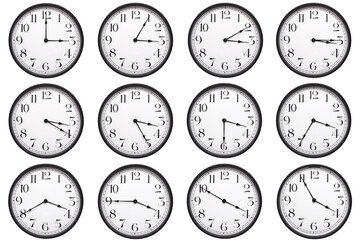 A set of classic round analog wall clocks with black frames and bold numbers, each showing a...