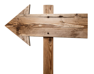 A worn aged wooden signpost features a large arrow pointing viewers left, highlightin