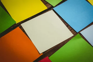 Fototapete Colorful papers arranged on floor © vectorfusionart