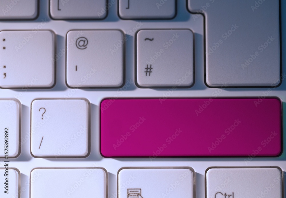 Poster digital composite of pink key on keyboard