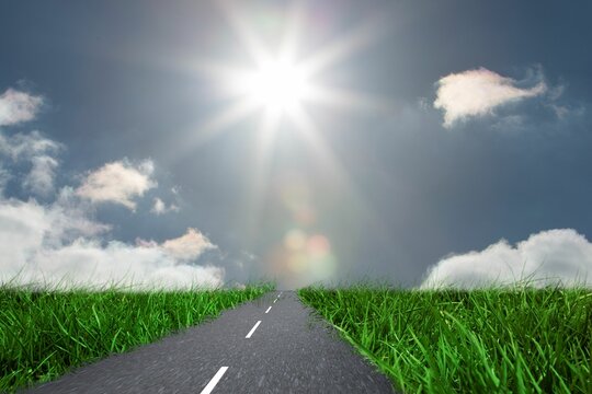 Fototapeta Flat illustration is showing paved road cutting through green grass under bright sun and clouds