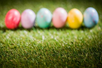 Fototapeta premium Colorful Easter eggs on grass
