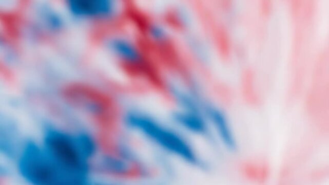 Red and blue tie dye swirling creating stunning visual effect