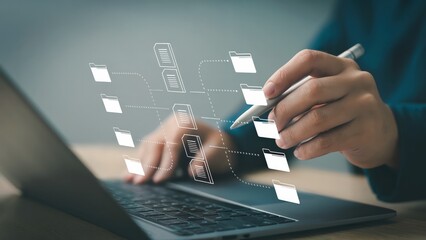 Data transfer using the laptop and pen showing file management system