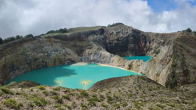 A beautiful view of Kelimutu Lake in Ende Regency, Flores, Indonesia. This mountain is famous for its three crater lakes, each with a distinct color, known as the Three Colored Lakes.
