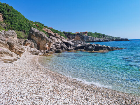 Turqouise waters at Porto Skala Beac - the best beach for snorkeling in Southern Kefalonia near Poros and Skala, Kefalonia island, Greece
